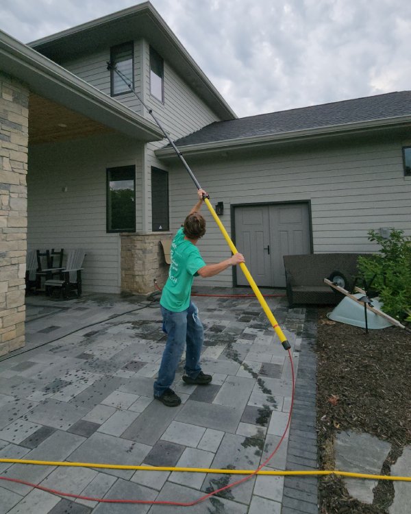 Water Fed Pole (WFP) cleaning system in action - Grace Window Cleaning