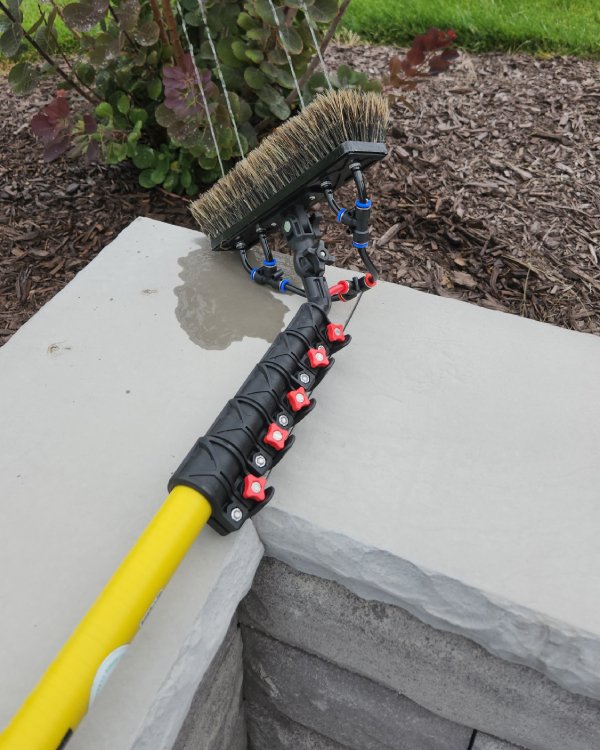 Water Fed Pole (WFP) cleaning system used by the Grace Window Cleaning Crew