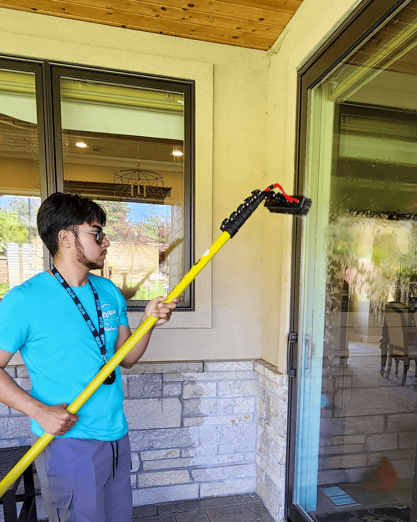 window cleaning crew making windows sparkle on Omaha homes